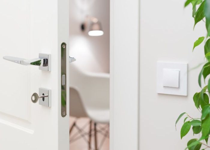 Close-up elements of the interior of the apartment. Ajar white d